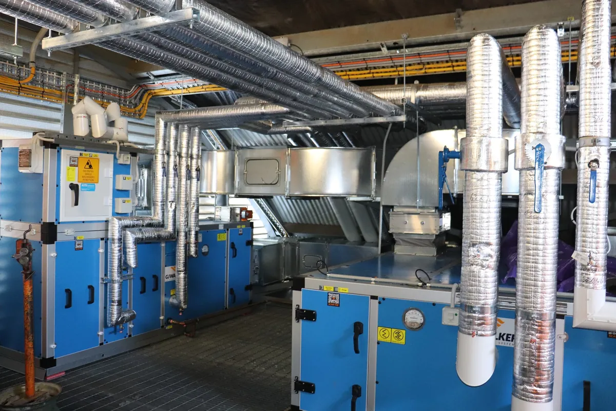 Plant room with air handling units and insulated flexible ductwork installed by CSG Air